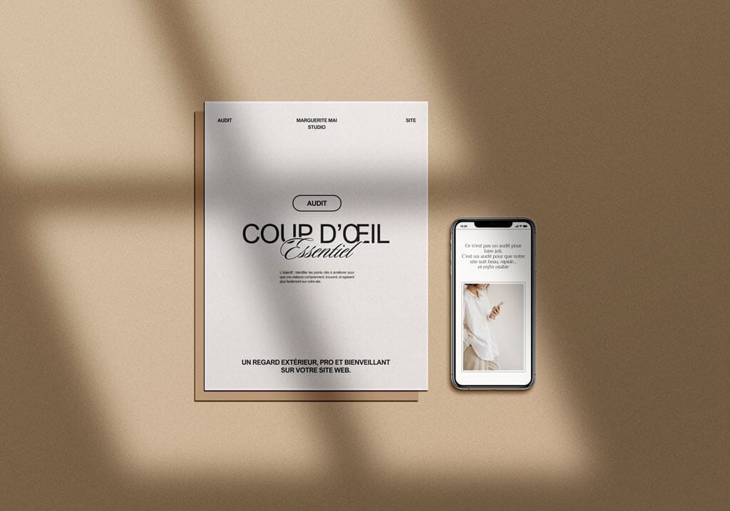 Rapport d'audit "Coup d'œil Essentiel" posé sur un bureau à côté d'un smartphone.